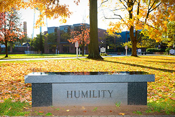 Humility bench on campus. Link to Gifts from Retirement Plans
